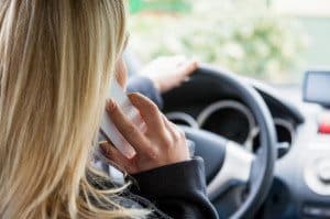 woman in the car phone